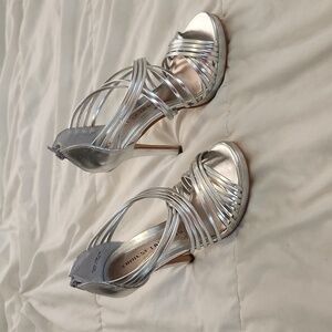 Never worn Chinese Laundry silver heels